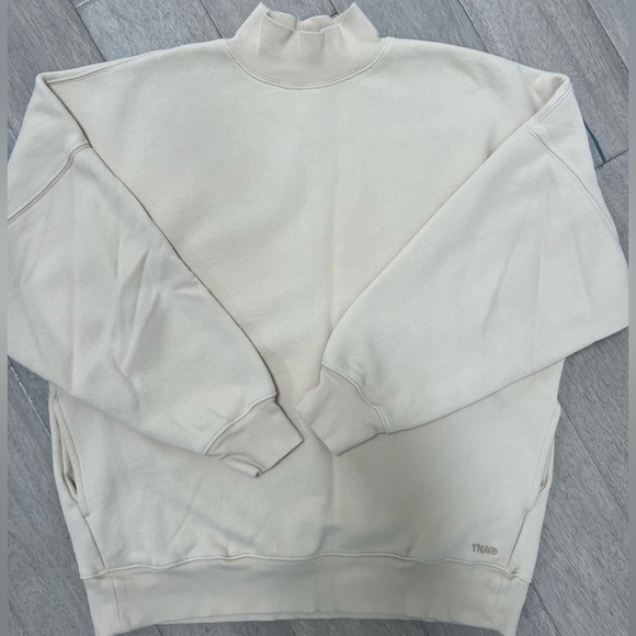 TNA Tops - Aritzia TNA Cozy Fleece Sweatshirt in Cream